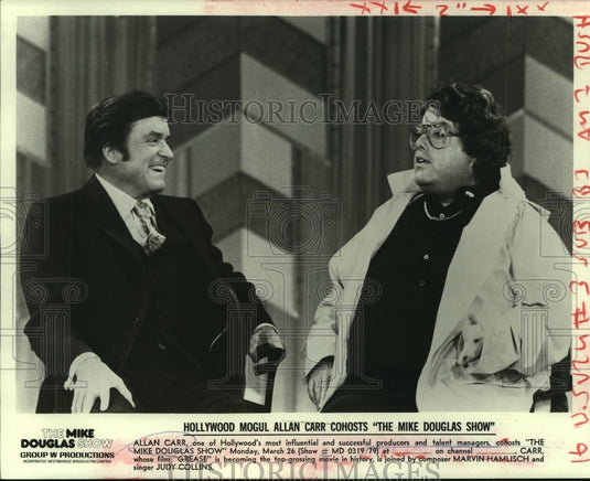 1979 Hollywood mogul Allan Carr co-hosts "The Mike Douglas Show." - Historic Images