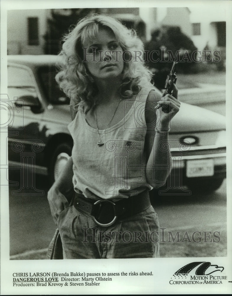 Brenda Bakke pauses to assess risk, in "Dangerous Love." - Historic Images