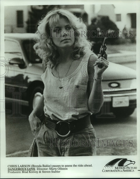 Brenda Bakke pauses to assess risk, in "Dangerous Love." - Historic Images