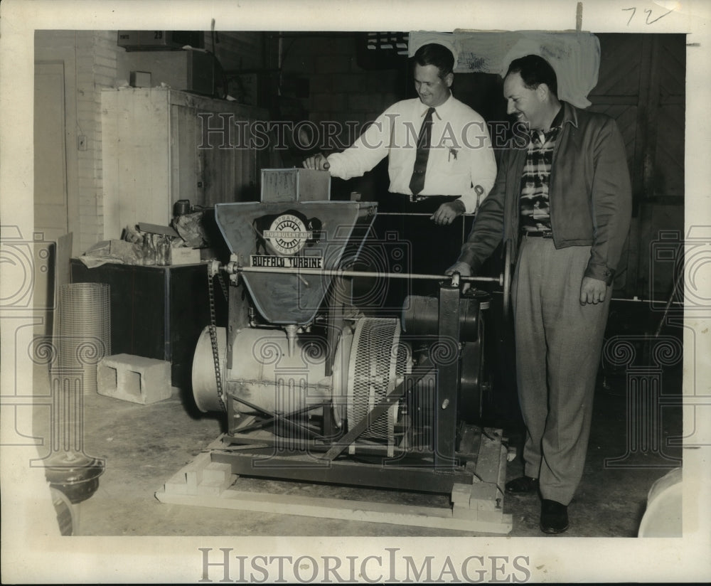 1957 Official of Custom Fogging, Inc. demonstrate Buffalo Turbine. - Historic Images