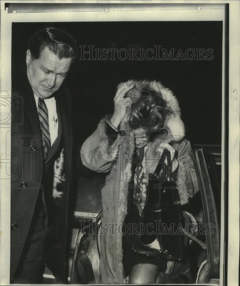 1969 Press Photo Actress Mona Crawford, escorted by police officer, New York-Historic Images