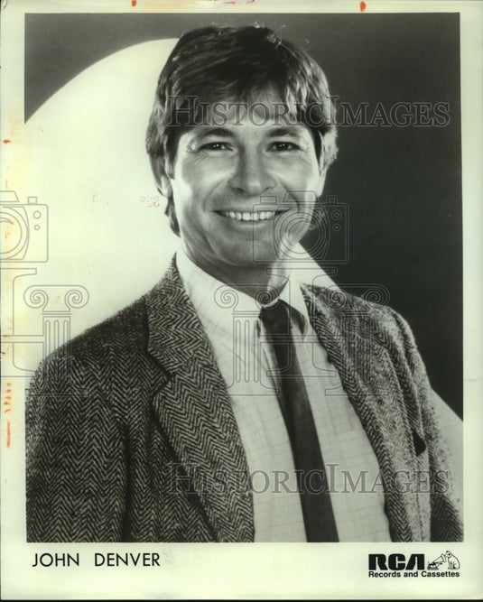 1986 John Denver, entertainer and recording artist for RCA Records - Historic Images