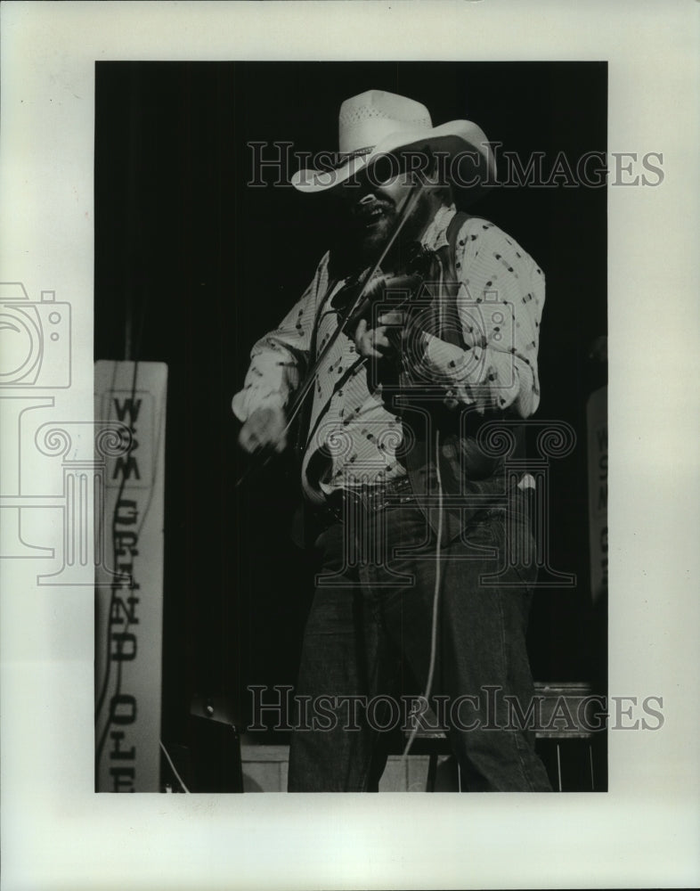 1976 Charlie Daniels performs at the Grand Ole Opry. - Historic Images