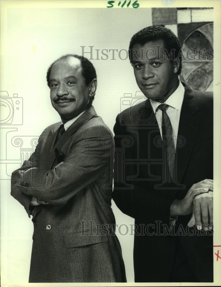 1986 Sherman Hemsley and Clifton Davis star on Amen, on NBC. - Historic Images