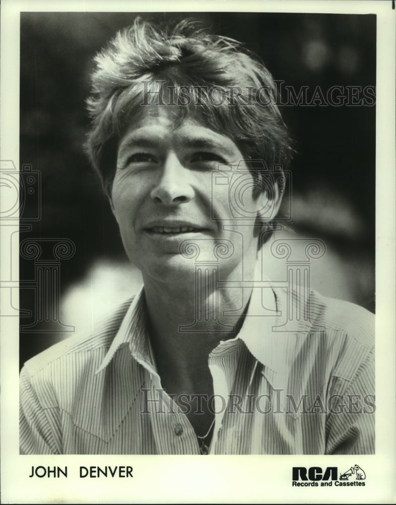 1984 John Denver, folk rock singer, songwriter, musician and actor. - Historic Images