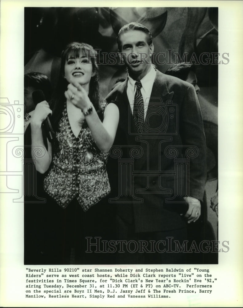 1991 Press Photo Shannen Doherty and Stephen Baldwin host New Years Rockin' Eve. - Historic Images