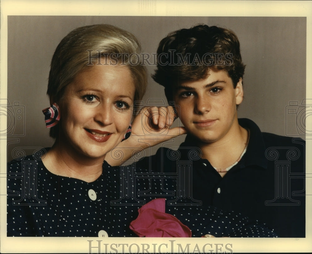 1986 Angela Hill, TV Journalist with her stepson Jim, - Historic Images