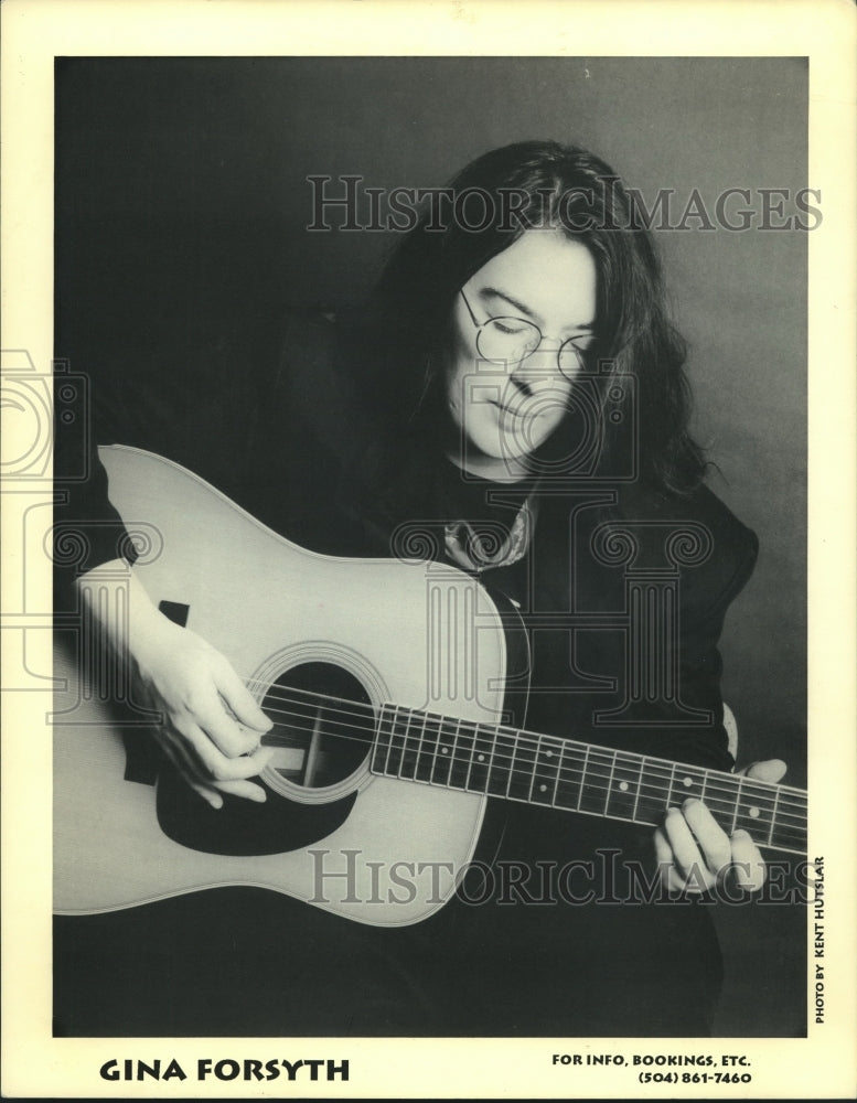 Gina Forsyth plays her guitar - Historic Images