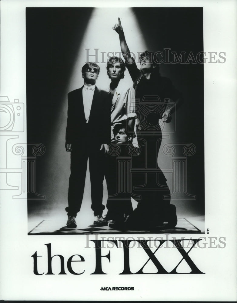 1984 Press Photo The Fixx, band members under a spotlight - nop25326 - Historic Images