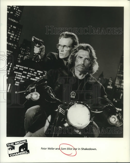 1989 Press Photo Actors Peter Weller and Sam Elliot in "Shakedown" - nop26016 - Historic Images