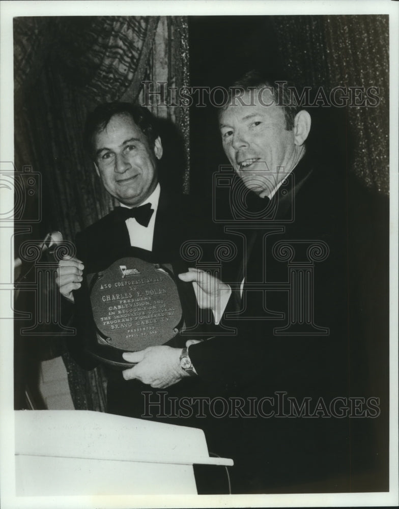 1981 Charles F. Dolan, of Bravo accepts award from Joel Berson - Historic Images