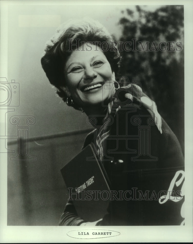 1979 Lila Garrett Holding Script - Historic Images