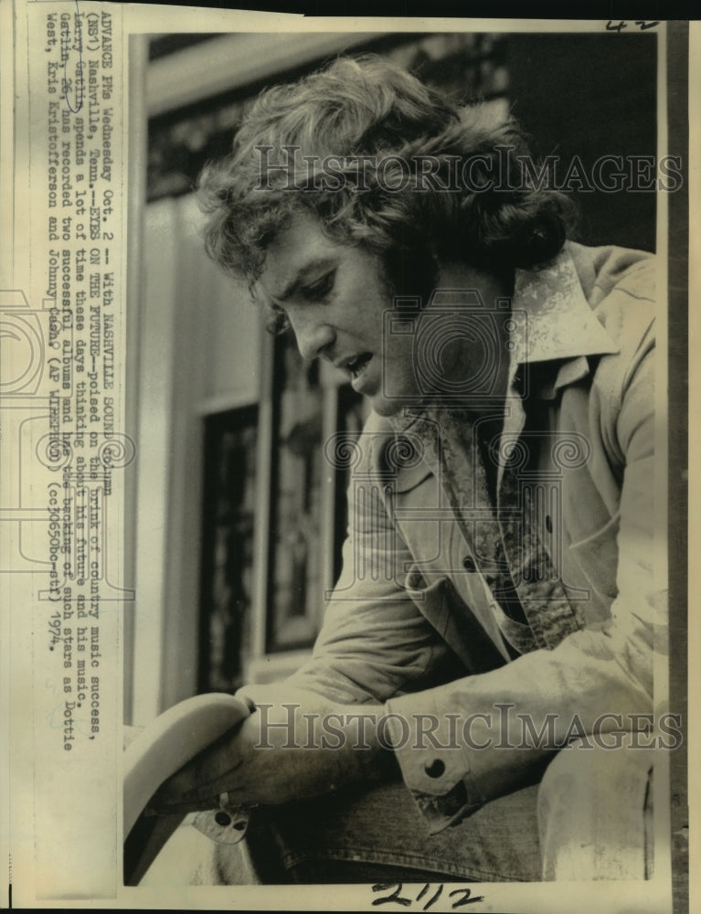 1974 Larry Gatlin, country music singer, thinks about his music - Historic Images