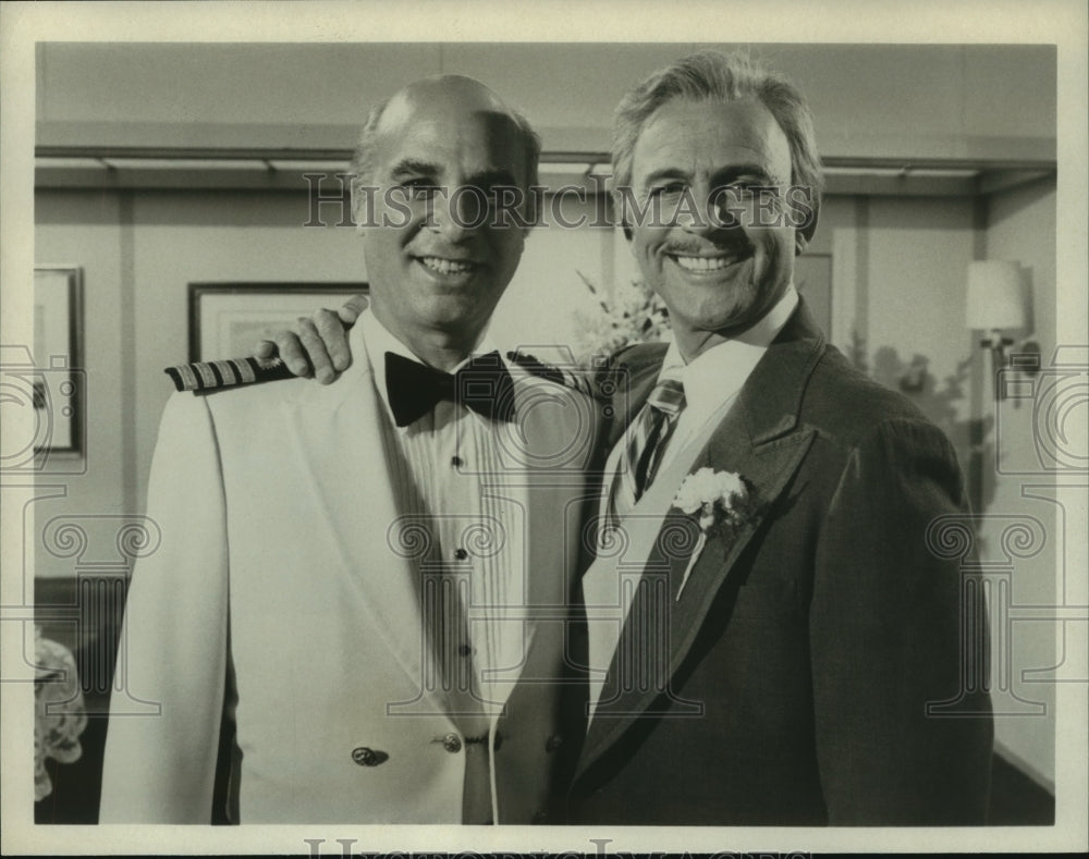 1980 Les Gerber and Gavin MacLeod co-star in The Love Boat - Historic Images