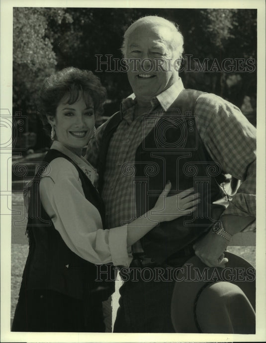 1989 Jeri Gaile & George Kennedy star in "Dallas"-Historic Images
