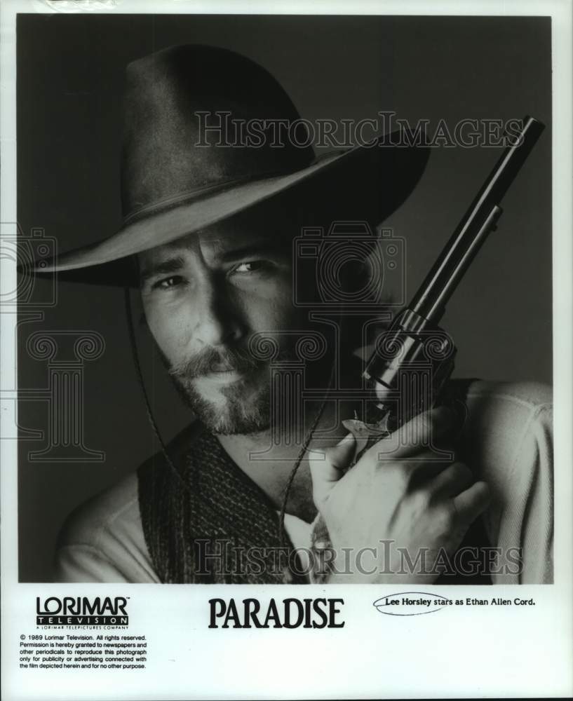 1989 Press Photo Lee Horsley stars on Paradise, television series. - nop39048-Historic Images