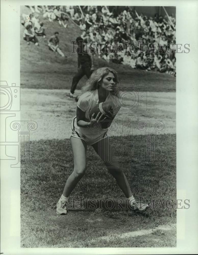 1983 Press Photo Audrey Landers of CBS hit series, &quot;Dallas&quot; plays football-Historic Images