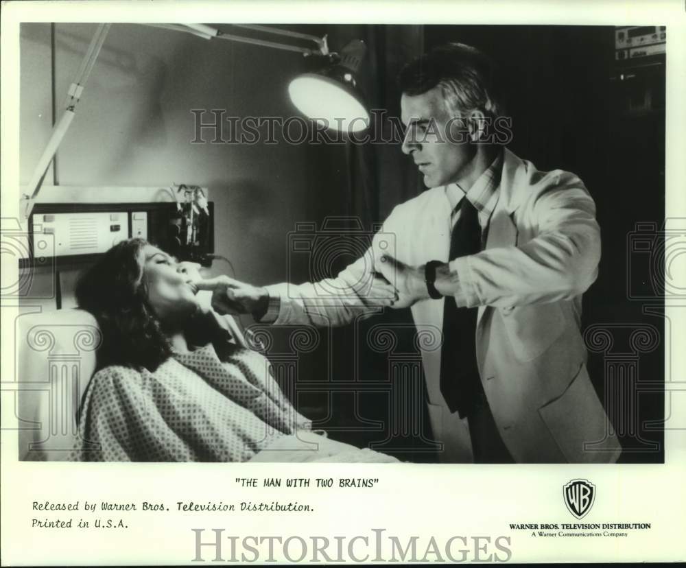 1989 Steve Martin examines a patient in &quot;The Man With Two Brains&quot; - Historic Images