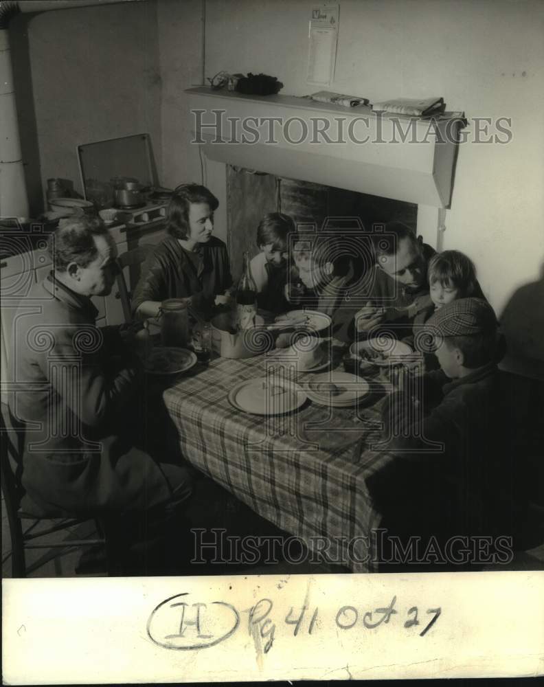 1968 Fauconnier family at dinner table in La Tardiere-Historic Images