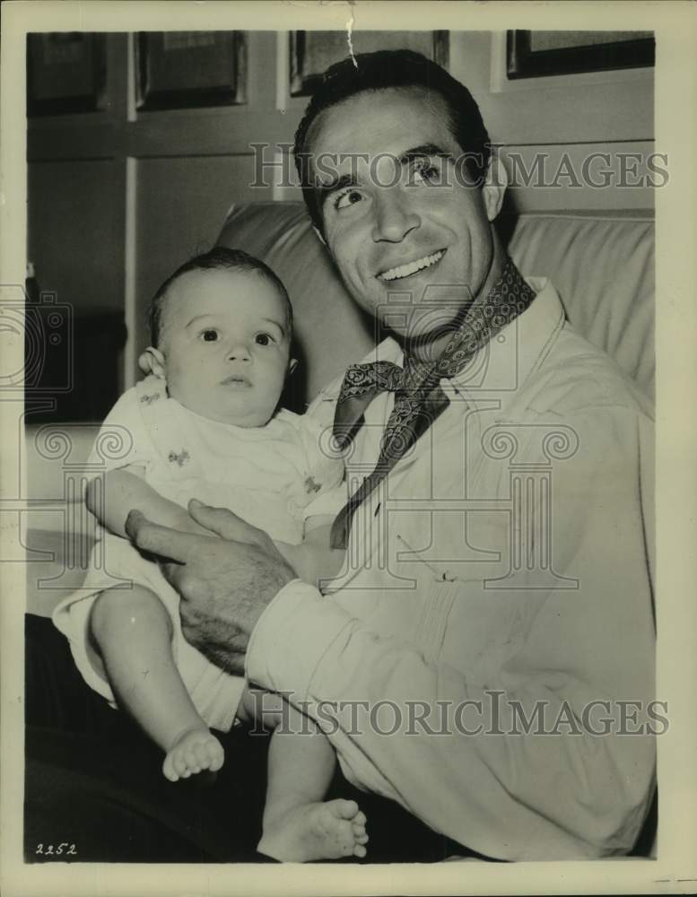 1953 Press Photo Ricardo Montalban playing with his son Victor - nop56972-Historic Images