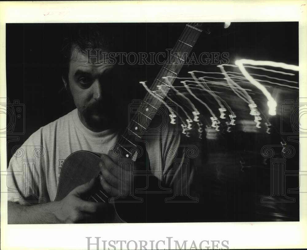 1993 Press Photo Guitarist Carlo Nuccio stands outside Carrolton streetcar barn-Historic Images