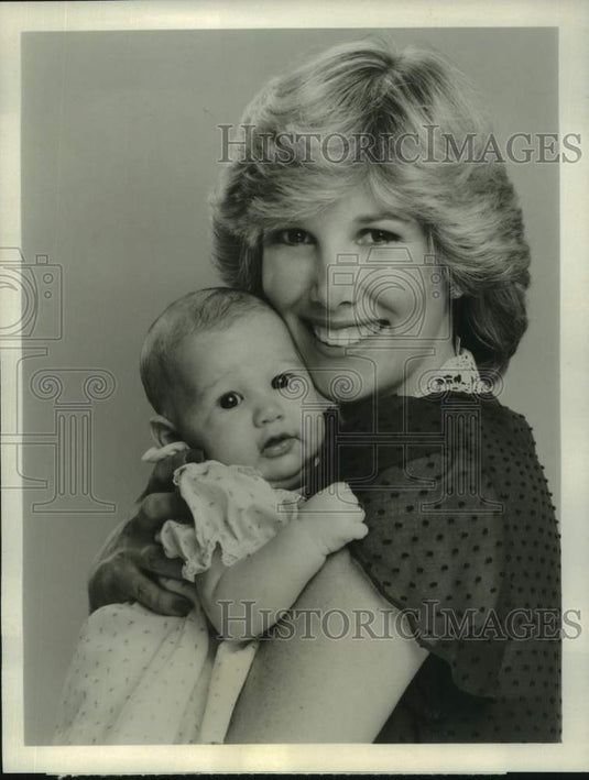 1980 Joan Lunden of "Good Morning America" on ABC-TV and her baby - Historic Images