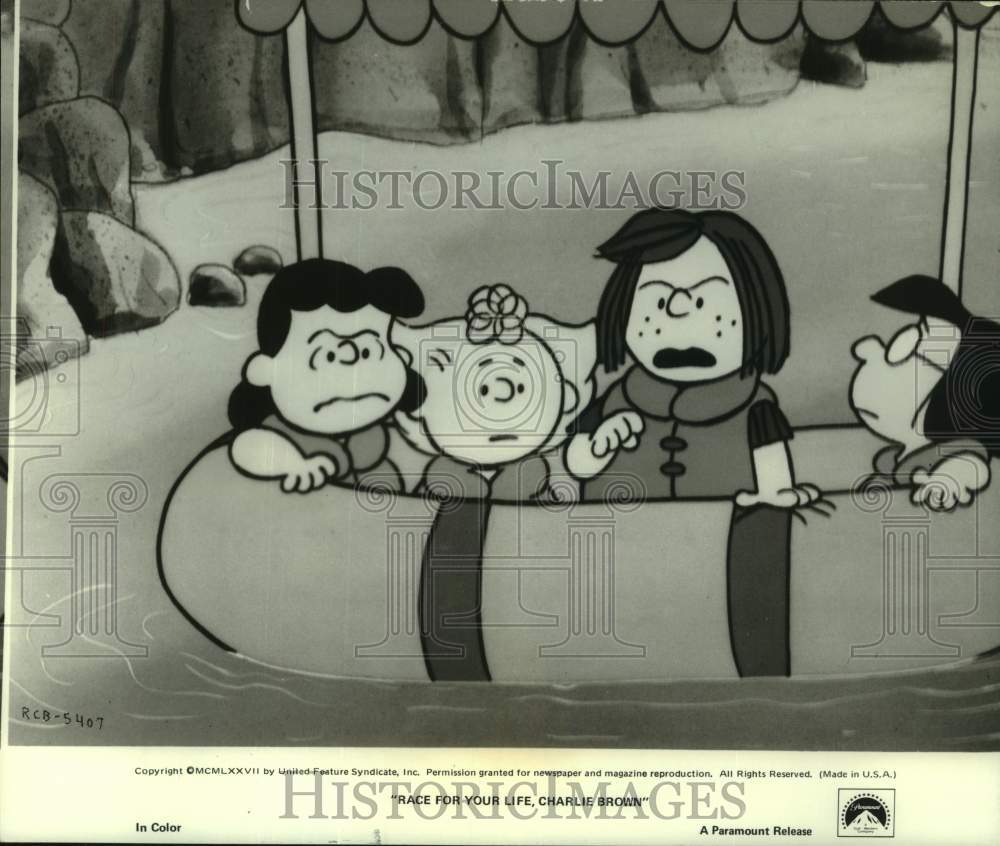 1977 Press Photo Peppermint Patty, Lucy, Sally and Marcie in river raft race-Historic Images