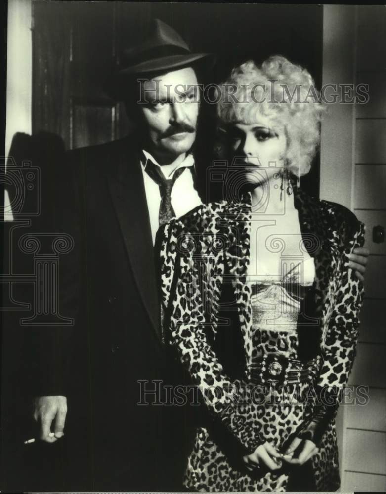 1987 Stacy Keach and Emma Samms starring in "The New Mike Hammer" - Historic Images