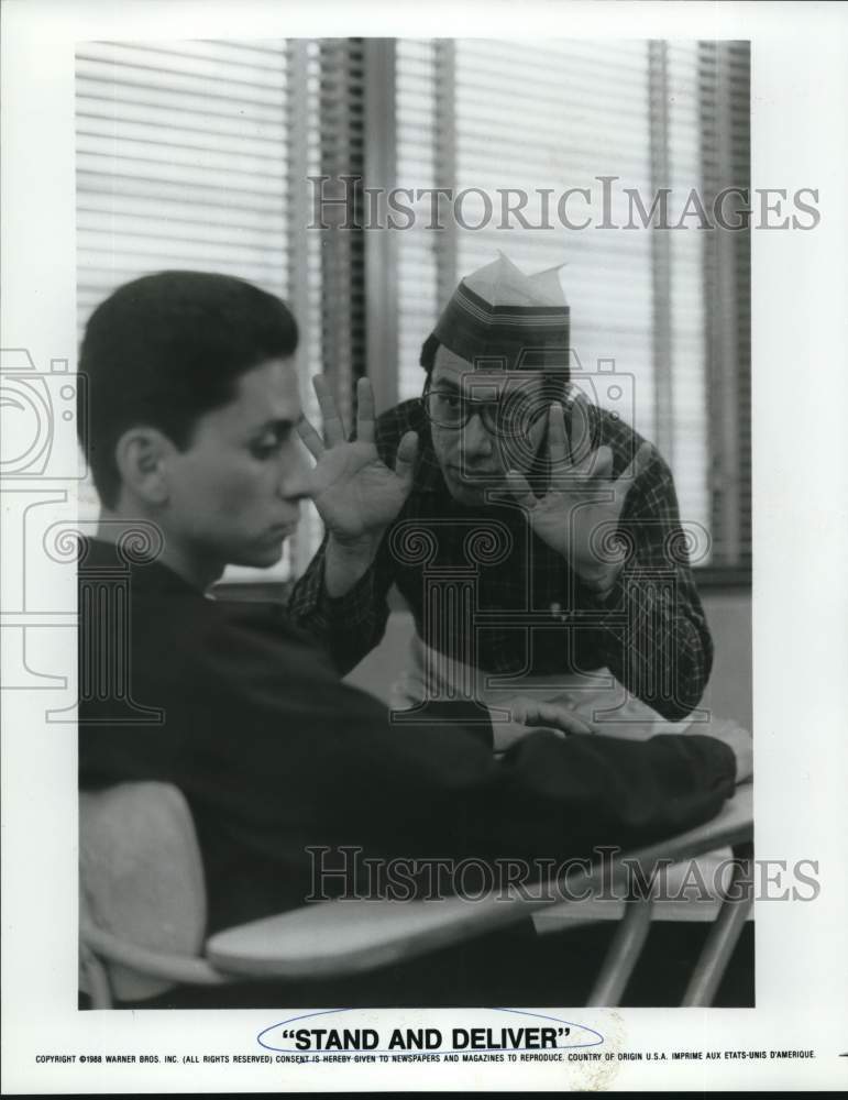 1989 Cast in a scene from "Stand and Deliver." from Warner Brothers. - Historic Images