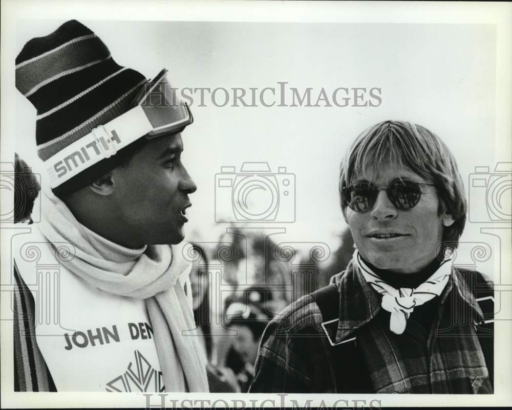 1979 Press Photo Lynn Swann and John Denver at Pro-Am Skiing Festival.- Historic Images