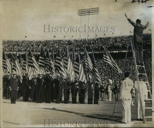 1961 Sugar Bowl- Combined bands led in playing of National Anthem. - Historic Images