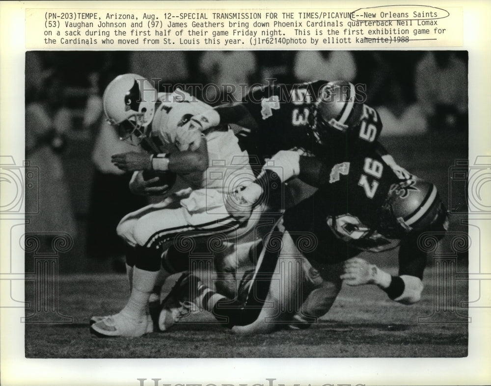 1988 New Orleans Saints-Saints bring down Cardinals QB Neil Lomax - Historic Images