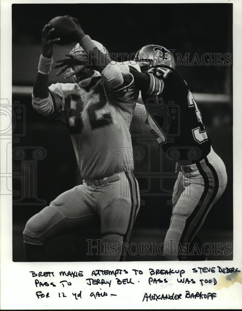 1985 New Orleans Saints- Brett Maxie attempts to break up pass. - Historic Images