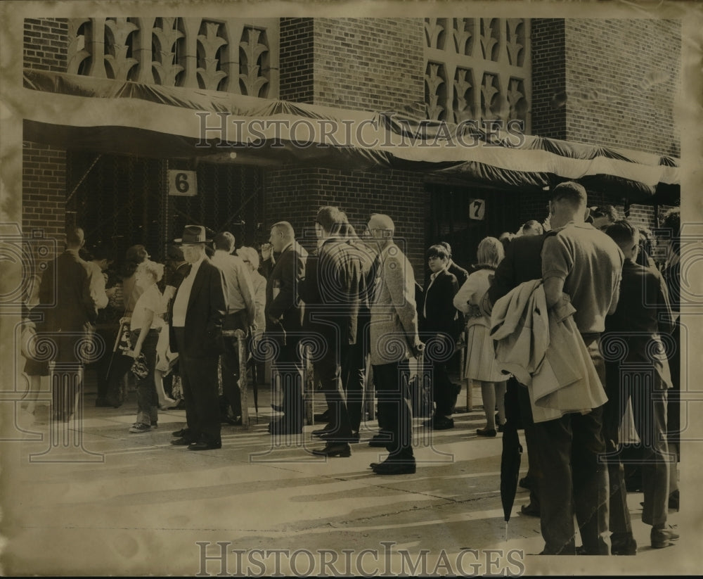 1966 Sugar Bowl- Visitors wait in line at Stadium. - Historic Images