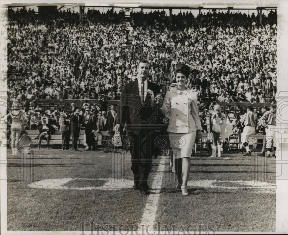 1966 Sugar Bowl- Sugar Queen and her escort. - Historic Images