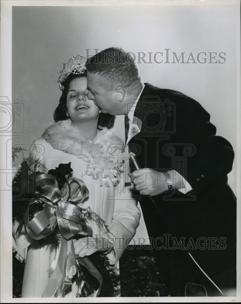 1964 Sugar Bowl- Sugar Queen gets a kiss at halftime. - Historic Images