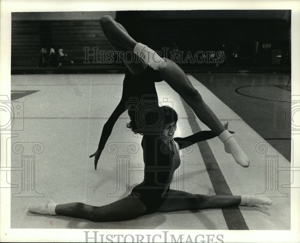 1985 Acrogymnastics - Tammy Blanda holds partner Gianna Giambelluc - Historic Images