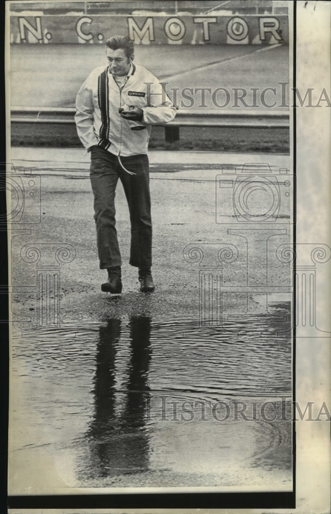 1971 Stock Car Driver Bobby Allison Looks at Wet Track - Historic Images