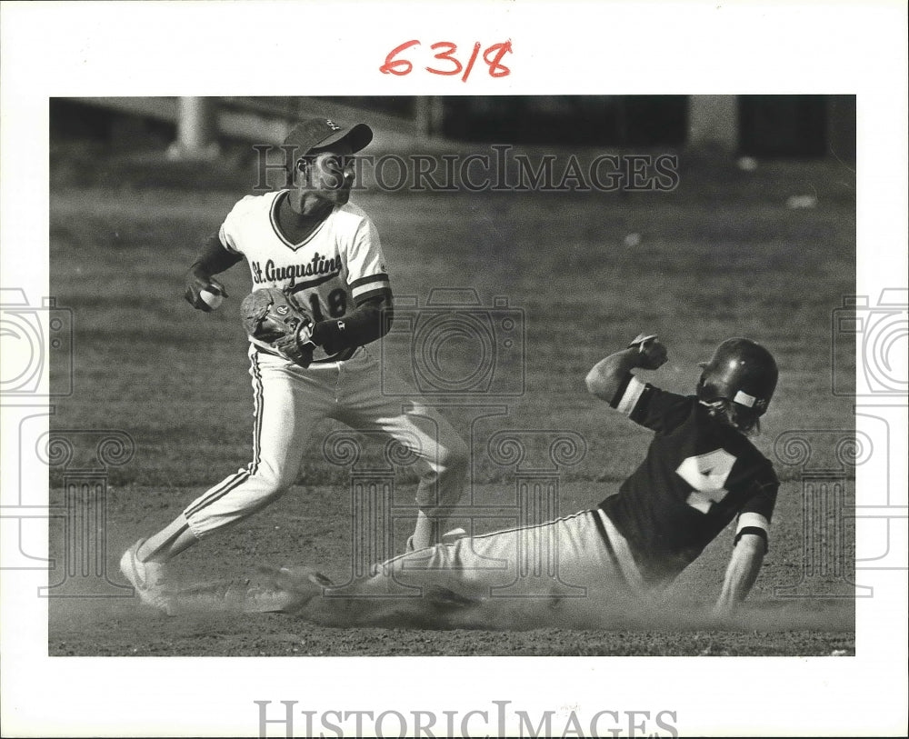 1986 Press Photo Saint Augustine Baseball Player at Base Throws Ball - nos03792- Historic Images