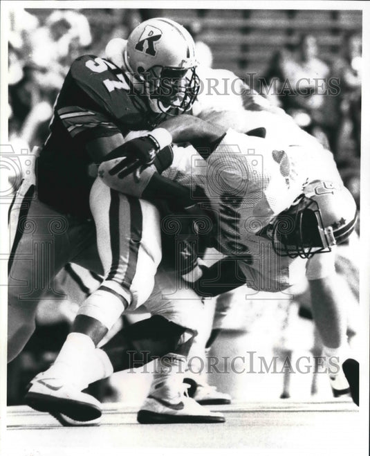 1989 Press Photo Football Player Brigance Rice with Others in Game - nos07308- Historic Images