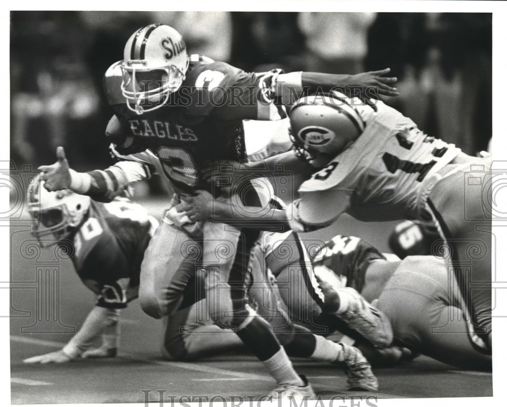 1987 Press Photo Football Player Larry Caliste with Others in Game - nos07536 - Historic Images