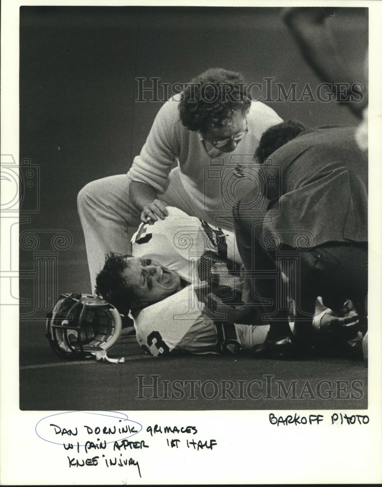 1986 Press Photo Seattle Seahawks Dan Dornink in Pain From Knee Injury - Historic Images