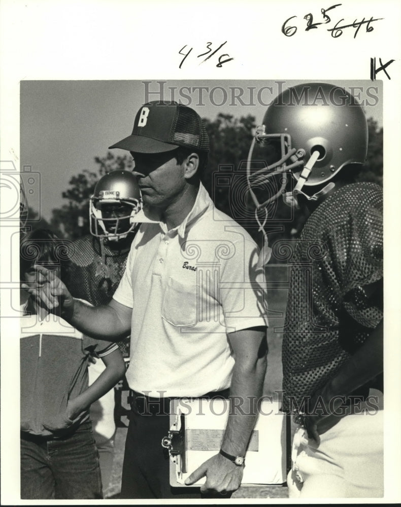 1981 Press Photo Amos Cormier, Buras Football Coach with Players - nos09131 - Historic Images