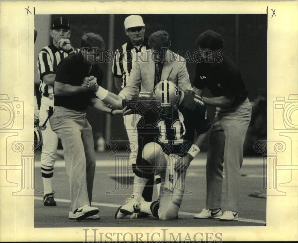 1990 Press Photo Injured New Orleans Saints football quarterback John Fourcade - Historic Images