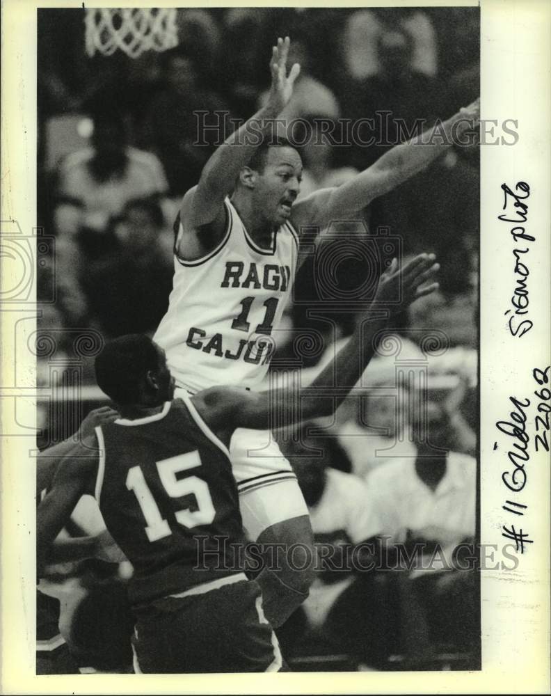 1989 Press Photo Basketball - Sydney Grider of USL Raises Hands - nos15951 - Historic Images