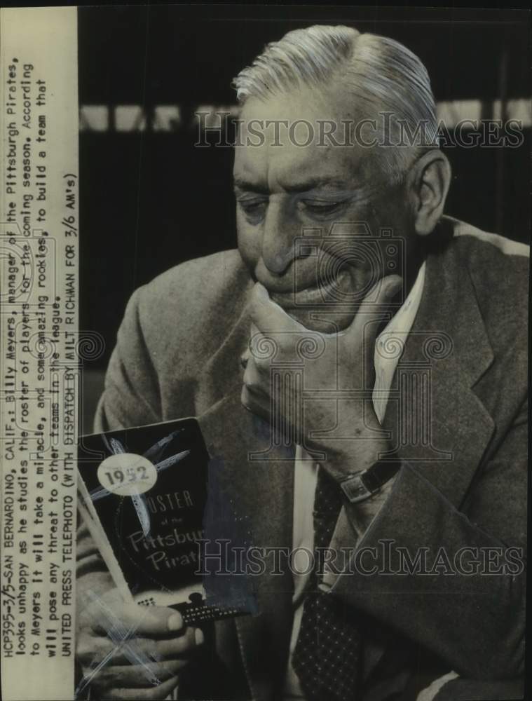 1952 Press Photo Pittsburgh Pirates baseball coach Billy Meyers looks at roster- Historic Images