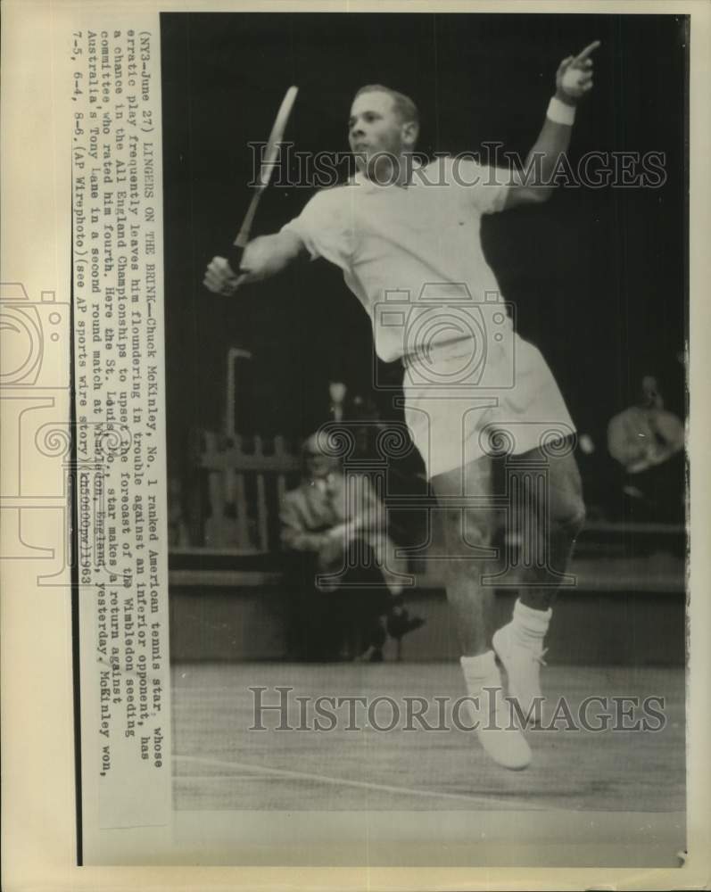 1963 Press Photo Tennis player Chuck McKinley returns a shot at Wimbledon - Historic Images