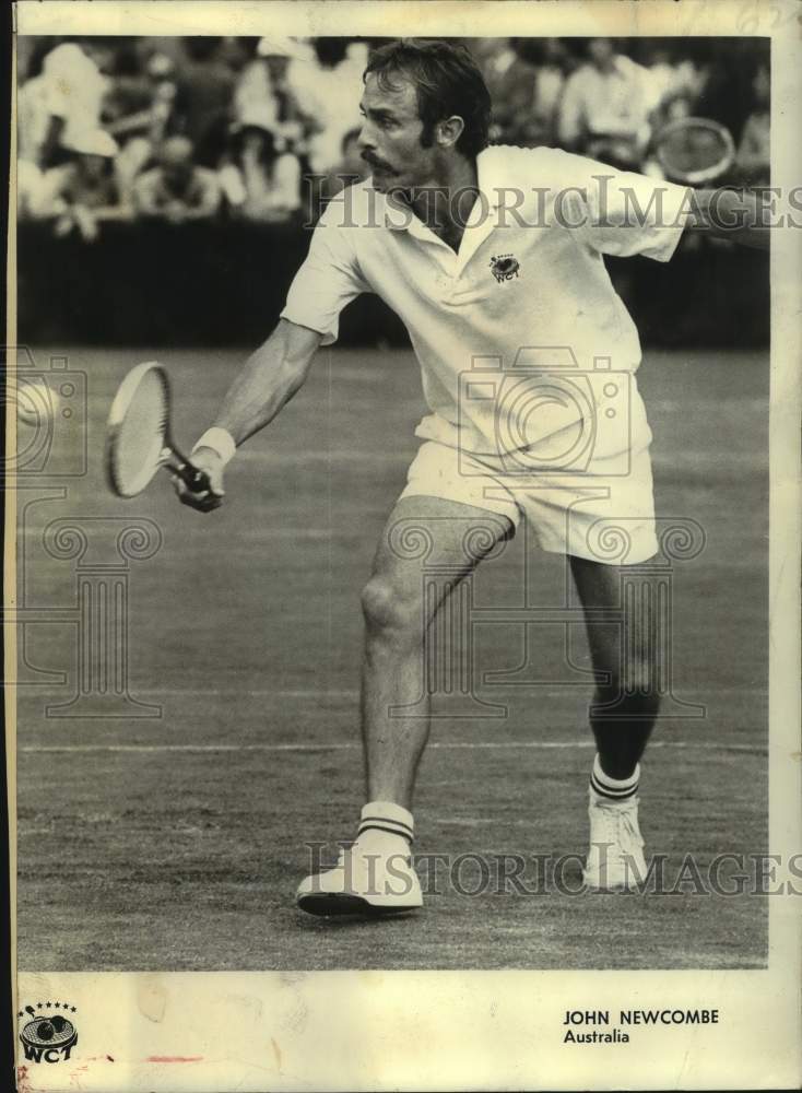 1974 Press Photo Australian tennis player John Newcombe returns a shot in match - Historic Images