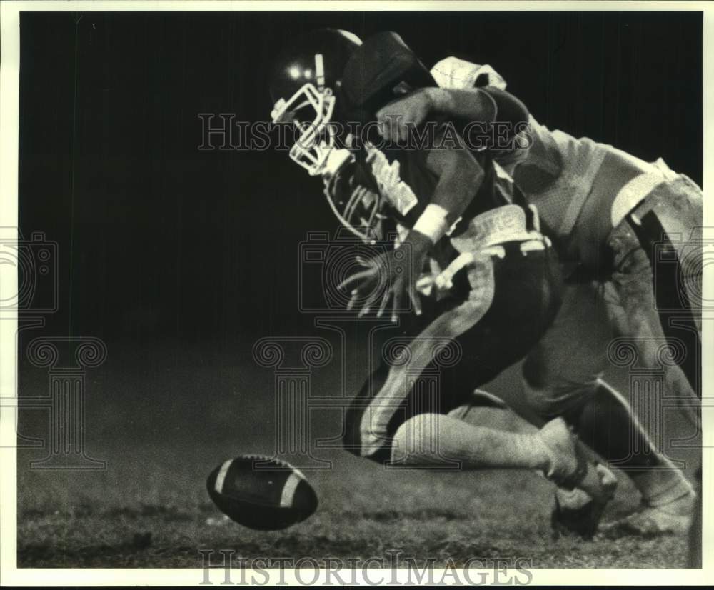 1985 Press Photo Football - Troy Moliere of Higgins is Sacked and Fumbled- Historic Images