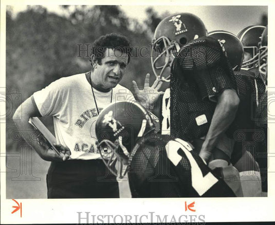 1983 Press Photo Riverside Academy football coach Frank Monica talks to players- Historic Images